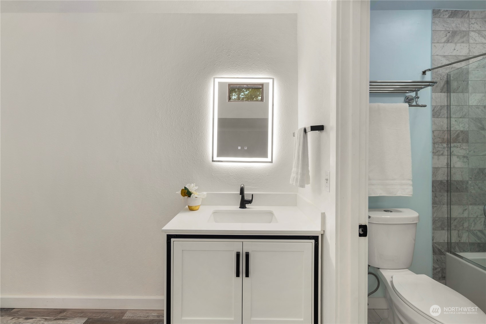 7307 Sand Point Way Northeast, Unit B618 Seattle, WA 98115 - Photo 21 of 23 a bathroom with a sink toilet and shower