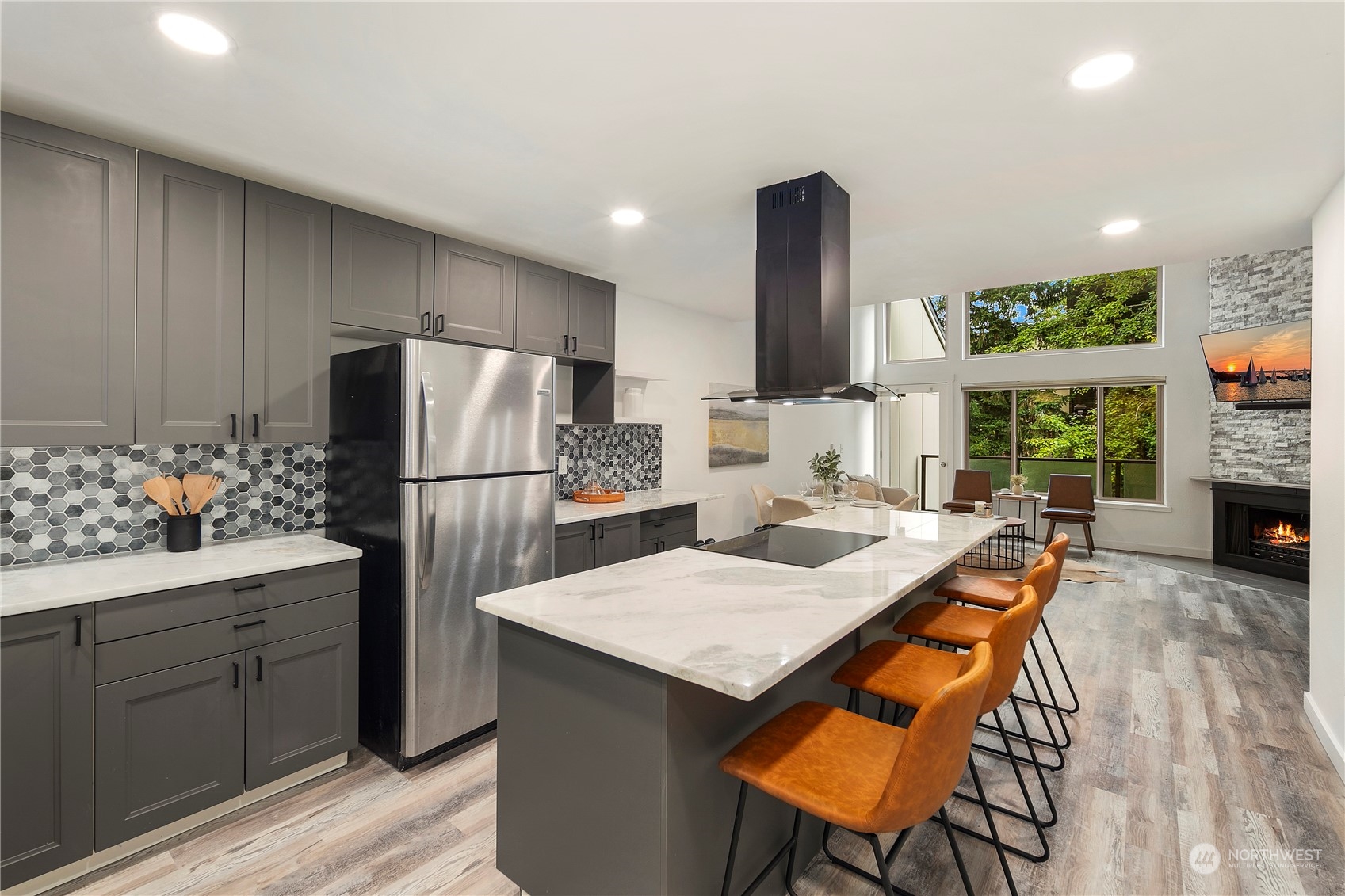 7307 Sand Point Way Northeast, Unit B618 Seattle, WA 98115 - Photo 5 of 23 a kitchen with refrigerator and cabinets