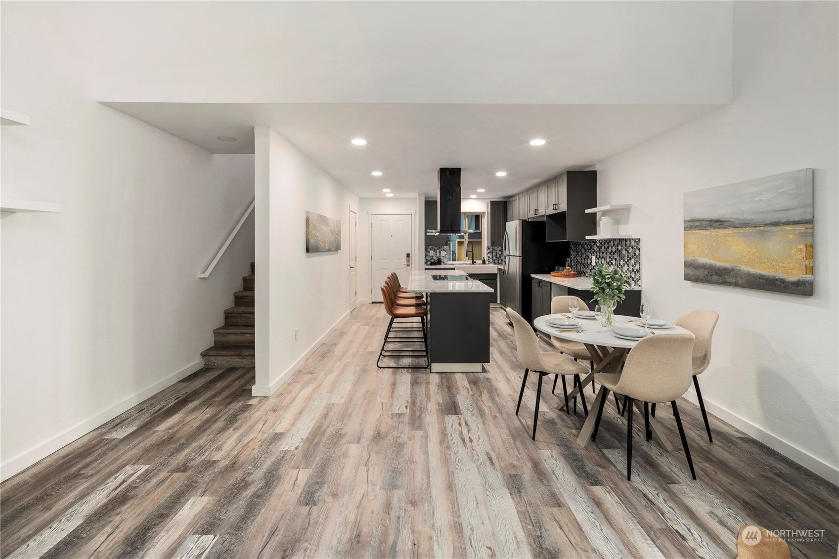 7307 Sand Point Way Northeast, Unit B618 Seattle, WA 98115 - Photo 10 of 23 a view of a dining room with furniture window and wooden floor