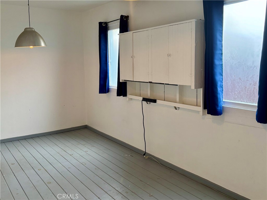 25 Galleon Street Marina del Rey, CA 90292 - Photo 23 of 41 a view of a room with wooden floor and white walls