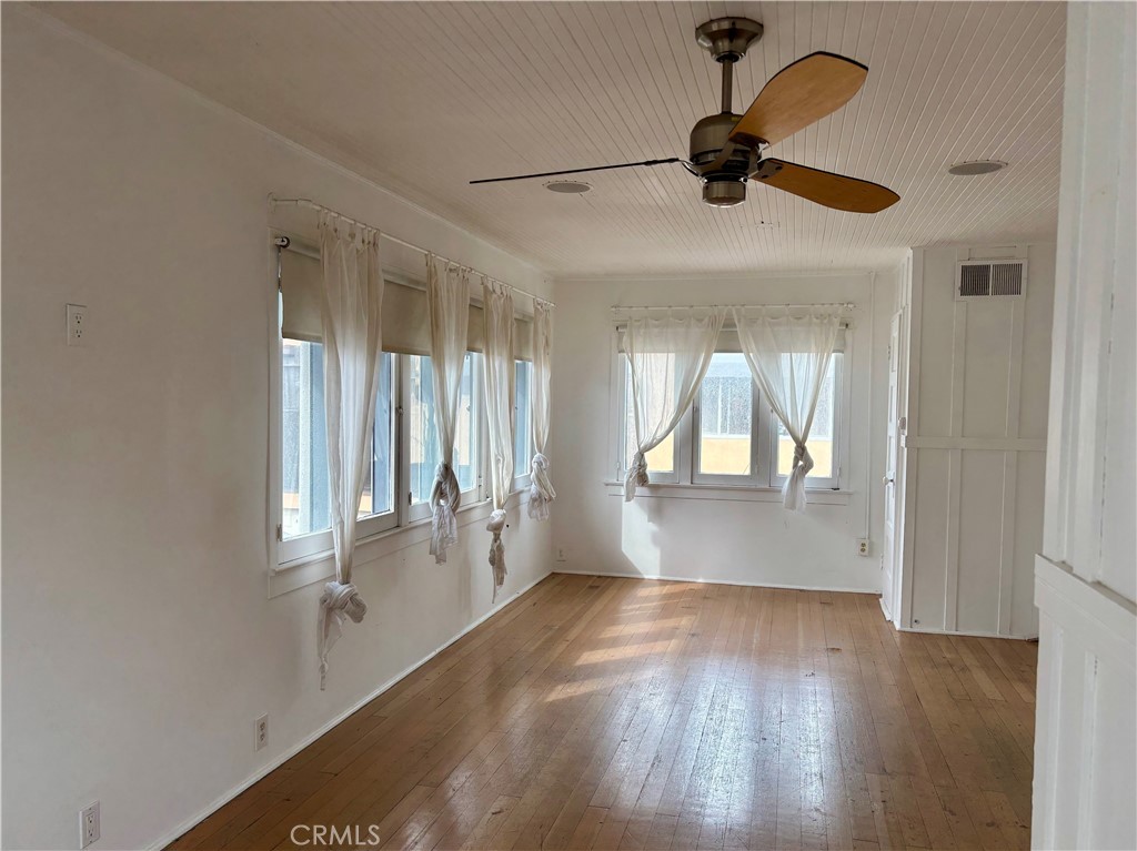 25 Galleon Street Marina del Rey, CA 90292 - Photo 3 of 41 wooden floor in an empty room with a window