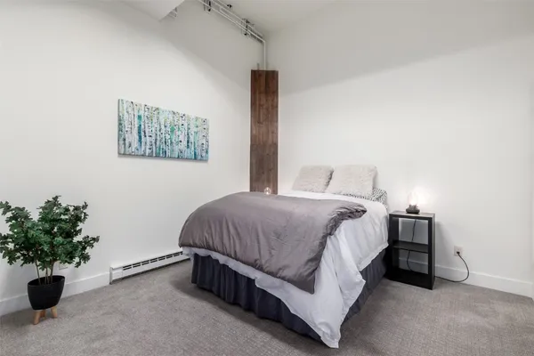 a view of a bathroom with a shower curtain