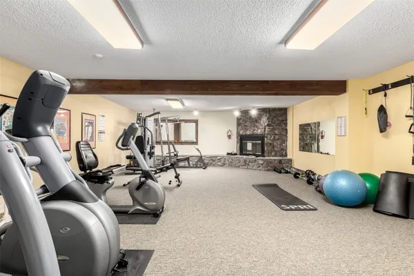 a bathroom with a toilet a sink and a mirror