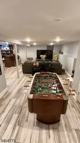 a view of a living room with furniture and kitchen