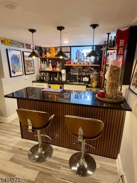 120 Union Street Lodi, NJ 07644 - Photo 12 of 18 a dining room with furniture and wooden floor