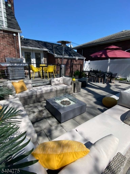 120 Union Street Lodi, NJ 07644 - Photo 18 of 18 a swimming pool with outdoor seating and a potted plants