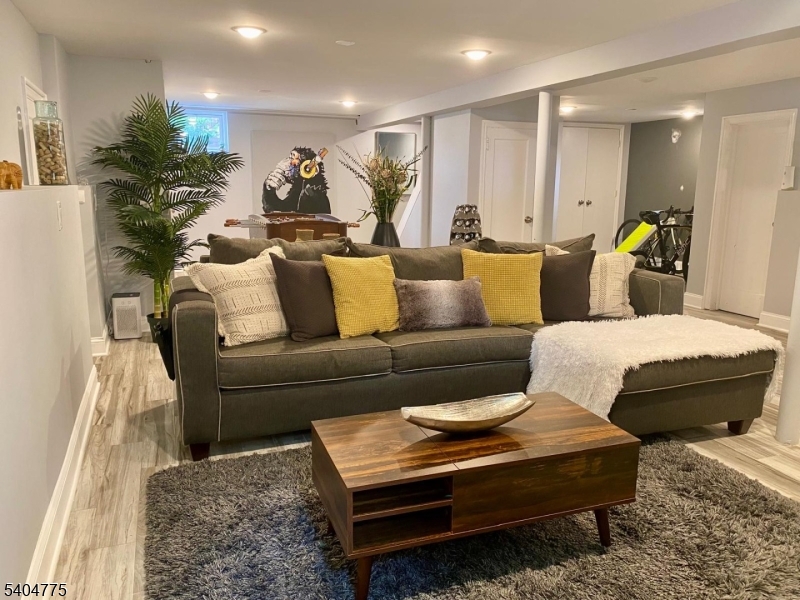 120 Union Street Lodi, NJ 07644 - Photo 9 of 18 a living room with furniture and a couch
