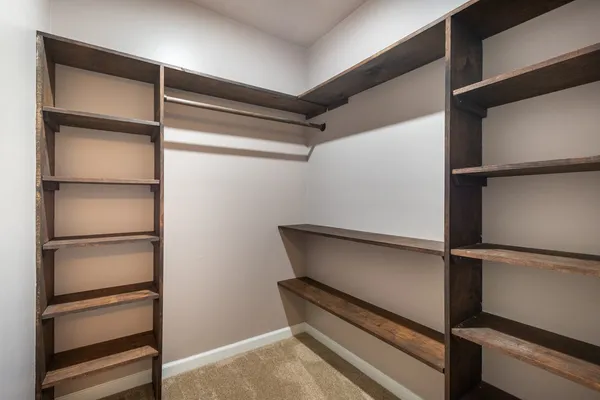a view of an empty walk in closet