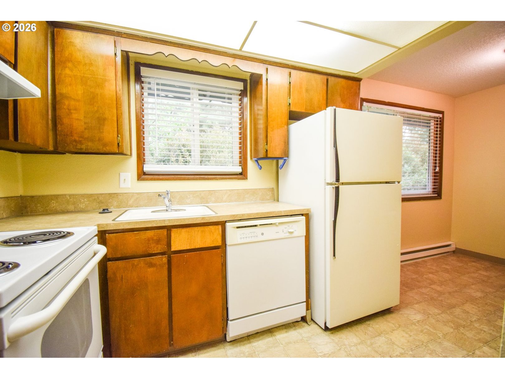 3124 19th Place Forest Grove, OR 97116 - Photo 10 of 31 a utility room with dryer and washer