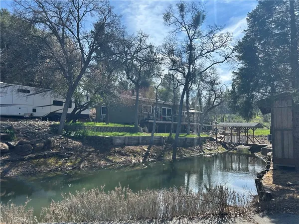 a view of a lake with a house