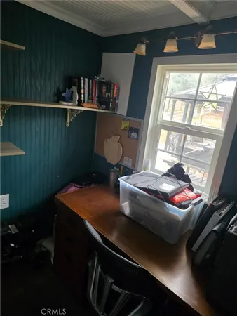 a bathroom with a sink and a window