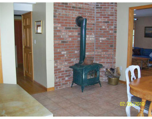184 Hartness Road Sutton, MA 01590 - Photo 5 of 20 a view of an outdoor kitchen and dining room