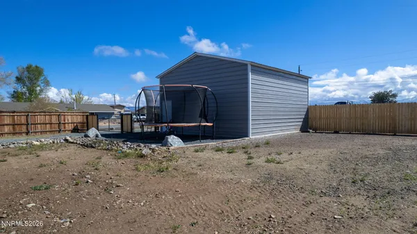 a view of a house with a garage