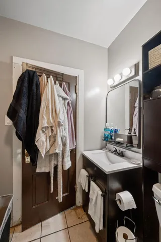 a bathroom with a sink and mirror