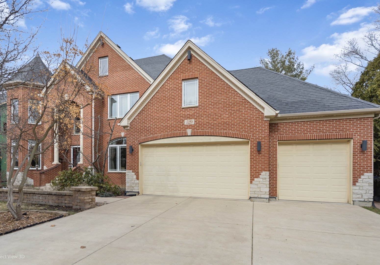 529 East Hillside Road Naperville, IL 60540 - Photo 1 of 1 a front view of a house with a yard and garage