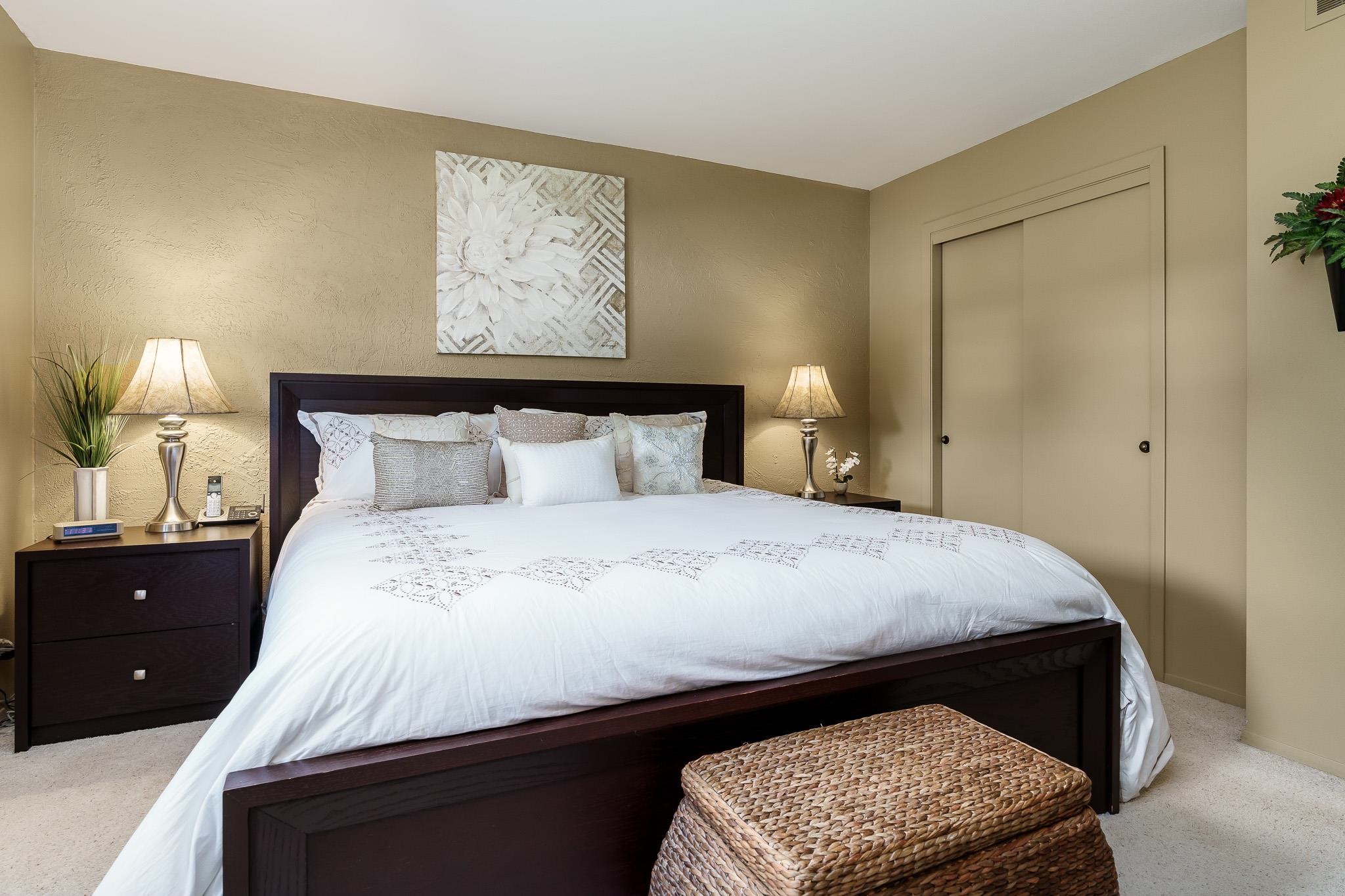 11748 Cedarbrook Road Roscoe, IL 61073 - Photo 19 of 50 a bedroom with a bed and a lamp