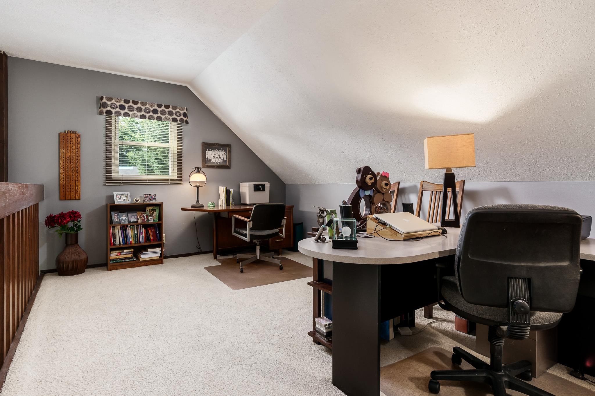 11748 Cedarbrook Road Roscoe, IL 61073 - Photo 25 of 50 a view of a workspace with furniture and a window