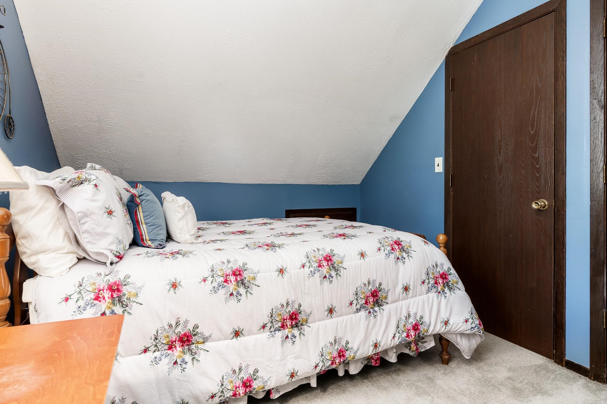 11748 Cedarbrook Road Roscoe, IL 61073 - Photo 29 of 50 a white bed with white sheets and pillows on it