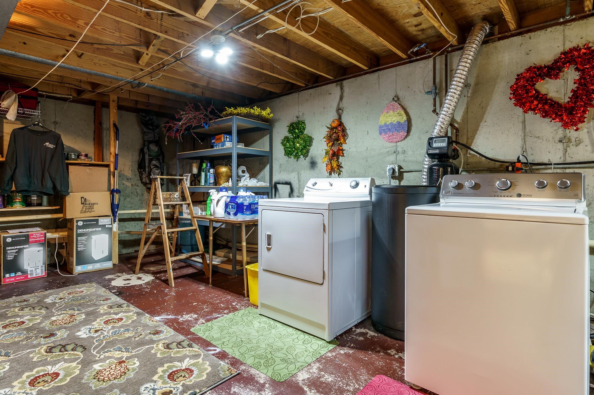 11748 Cedarbrook Road Roscoe, IL 61073 - Photo 38 of 50 a storage room with washer and dryer