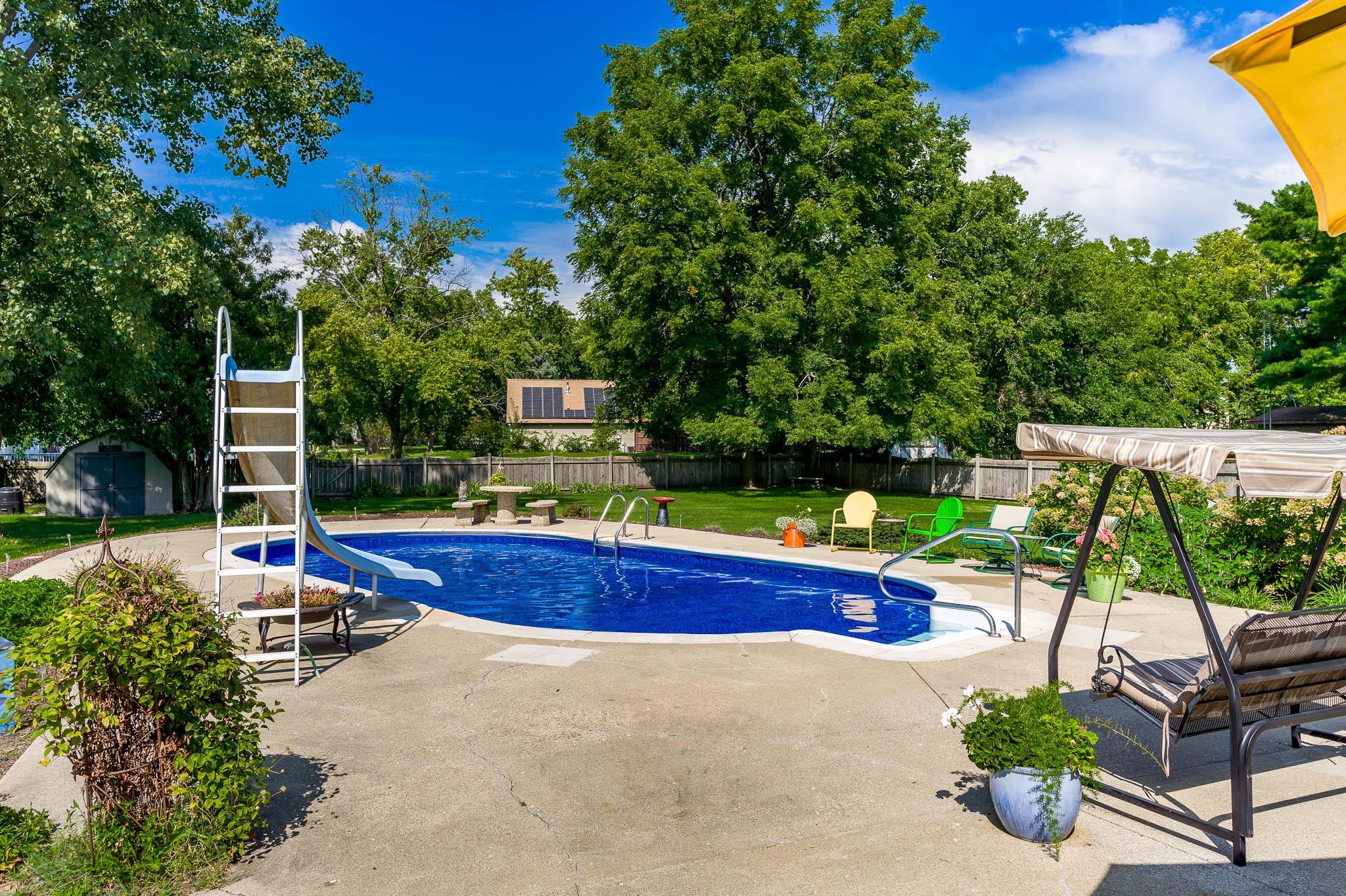 11748 Cedarbrook Road Roscoe, IL 61073 - Photo 40 of 50 a view of swimming pool with a patio
