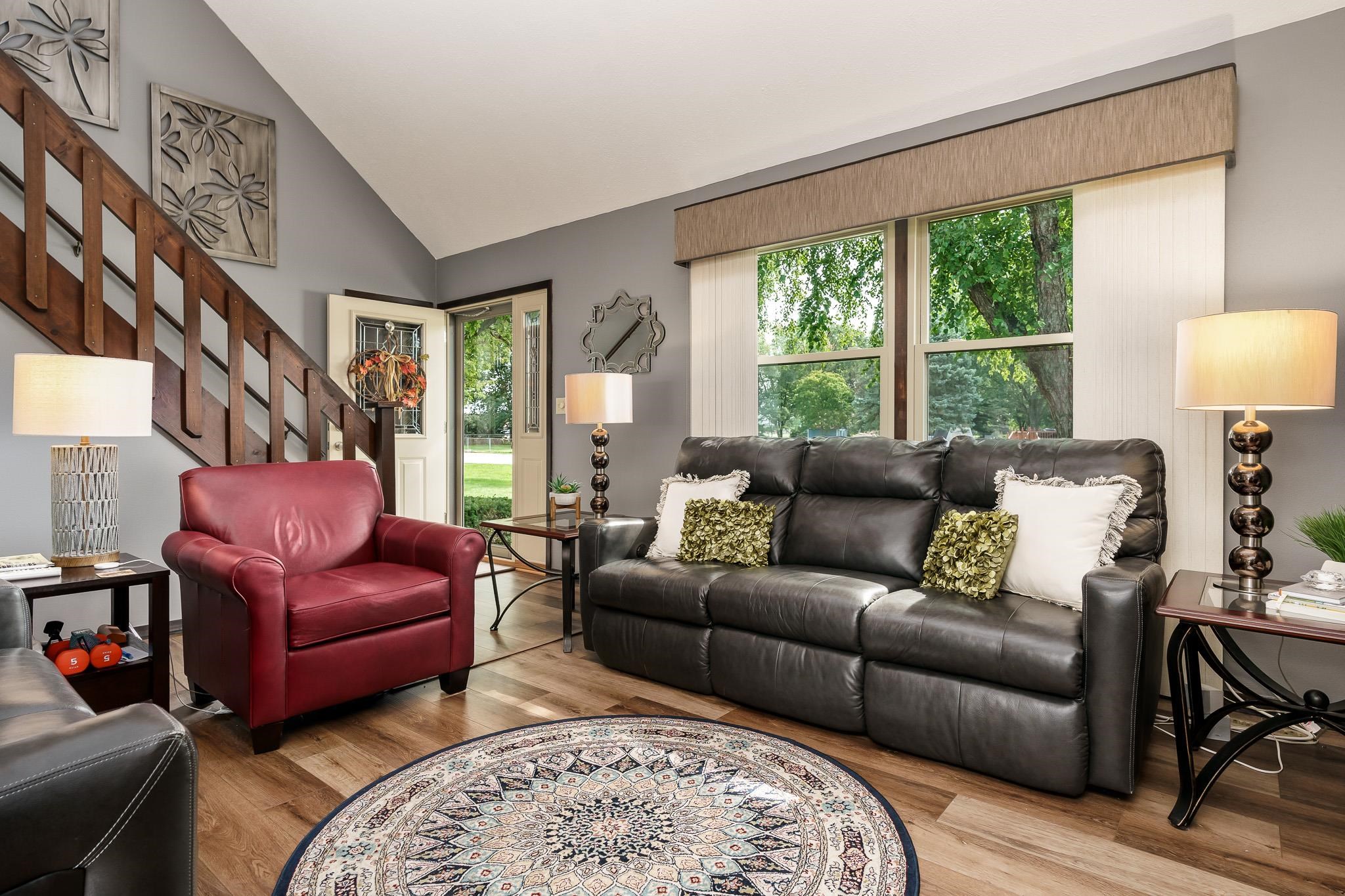 11748 Cedarbrook Road Roscoe, IL 61073 - Photo 8 of 50 a living room with furniture and a large window