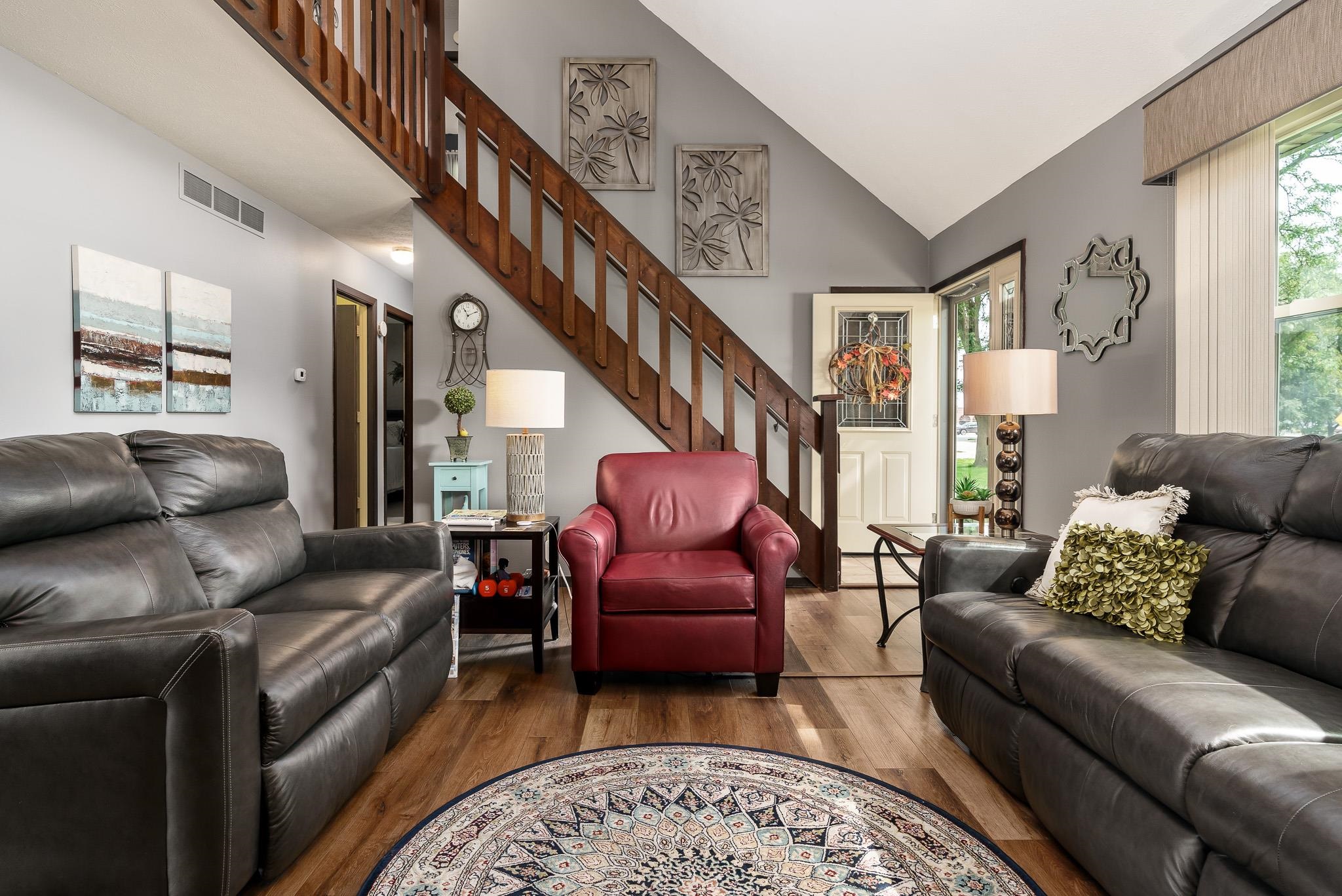 11748 Cedarbrook Road Roscoe, IL 61073 - Photo 9 of 50 a living room with furniture and a large window