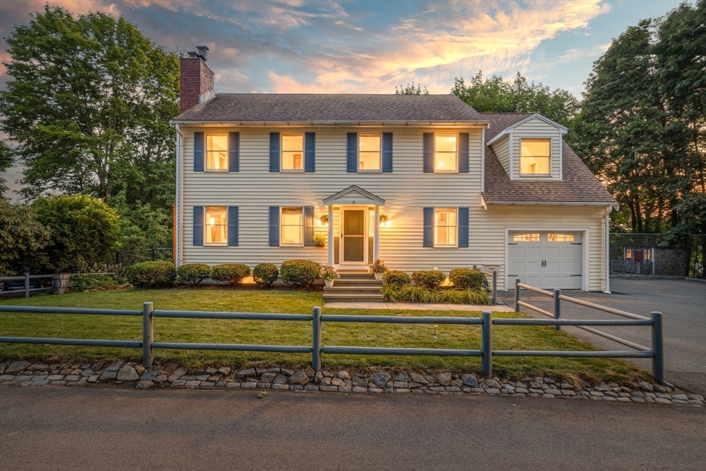 41 Filbert Street Quincy, MA 02169 - Photo 1 of 42 a front view of a house with a yard