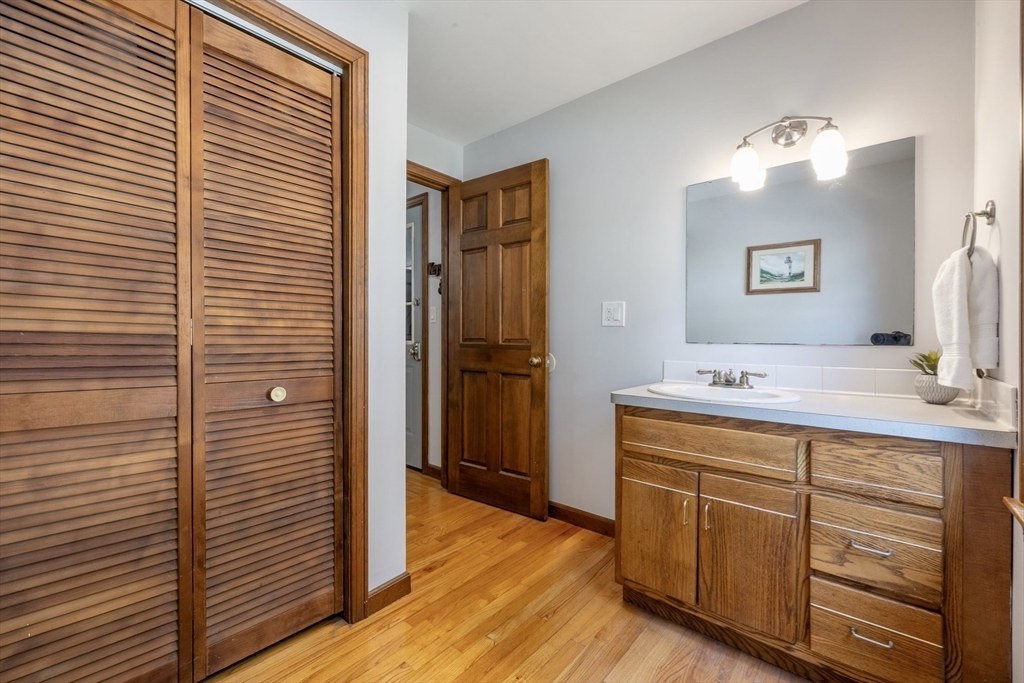 41 Filbert Street Quincy, MA 02169 - Photo 11 of 42 a bathroom with a sink and a mirror