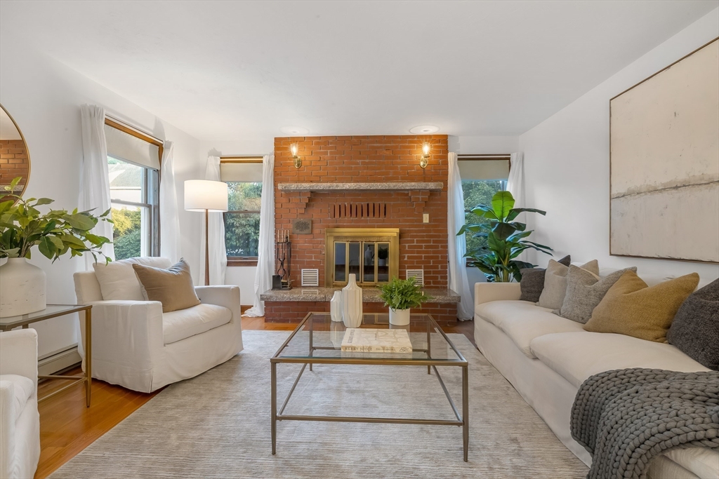 41 Filbert Street Quincy, MA 02169 - Photo 2 of 42 a living room with furniture and a large window