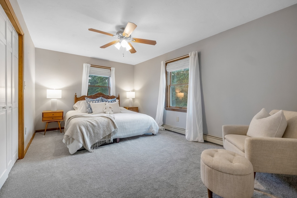 41 Filbert Street Quincy, MA 02169 - Photo 25 of 42 a bedroom with bed and a couch