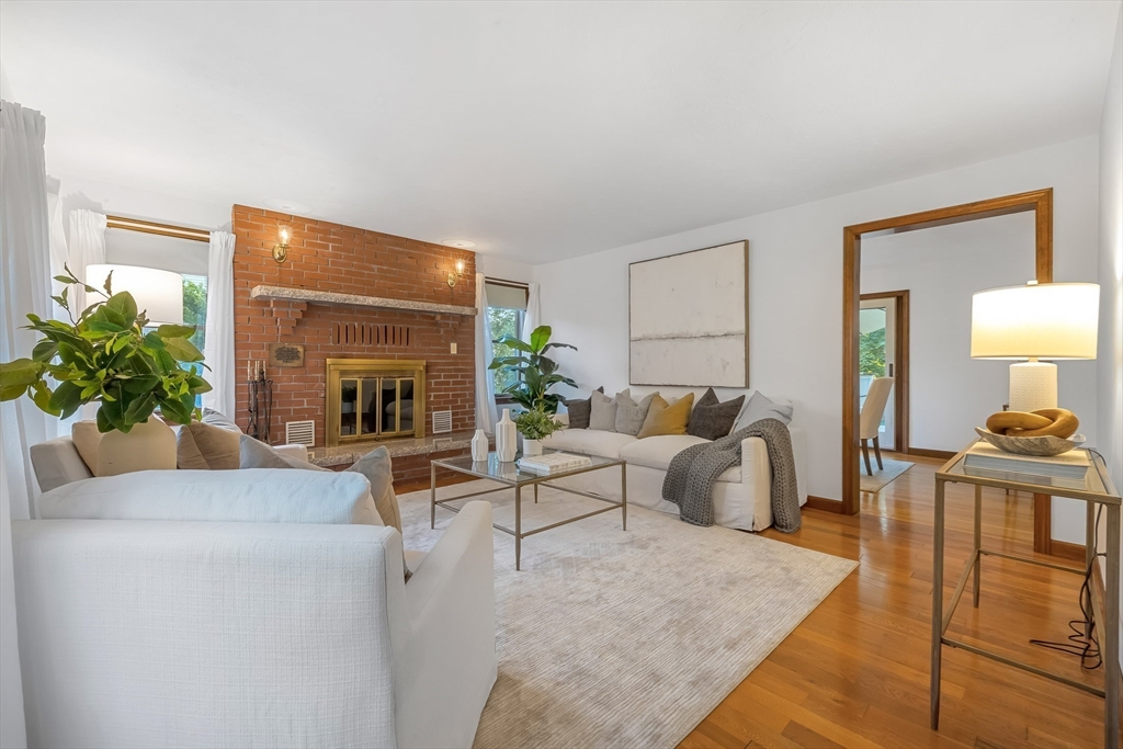 41 Filbert Street Quincy, MA 02169 - Photo 3 of 42 a living room with furniture and a fireplace