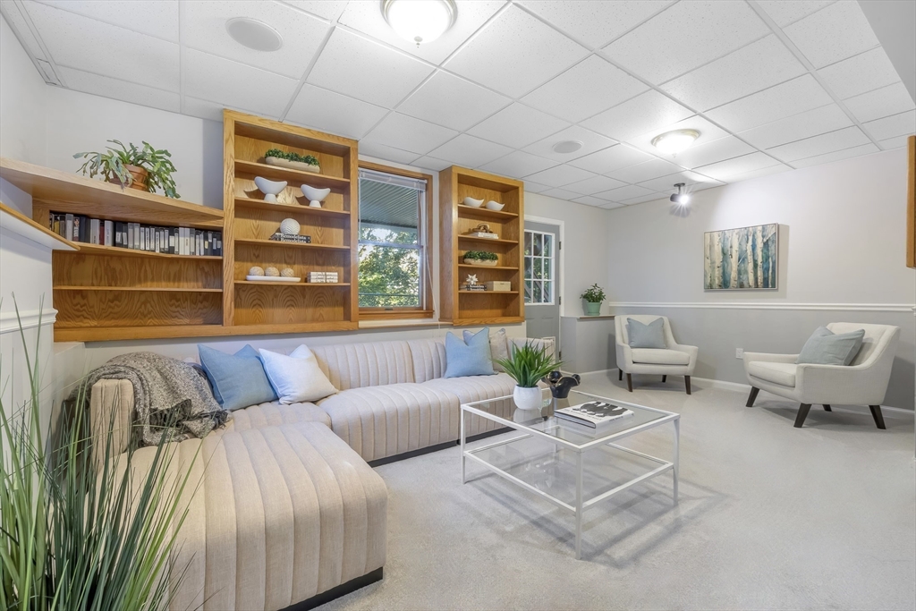 41 Filbert Street Quincy, MA 02169 - Photo 33 of 42 a living room with furniture and a large window