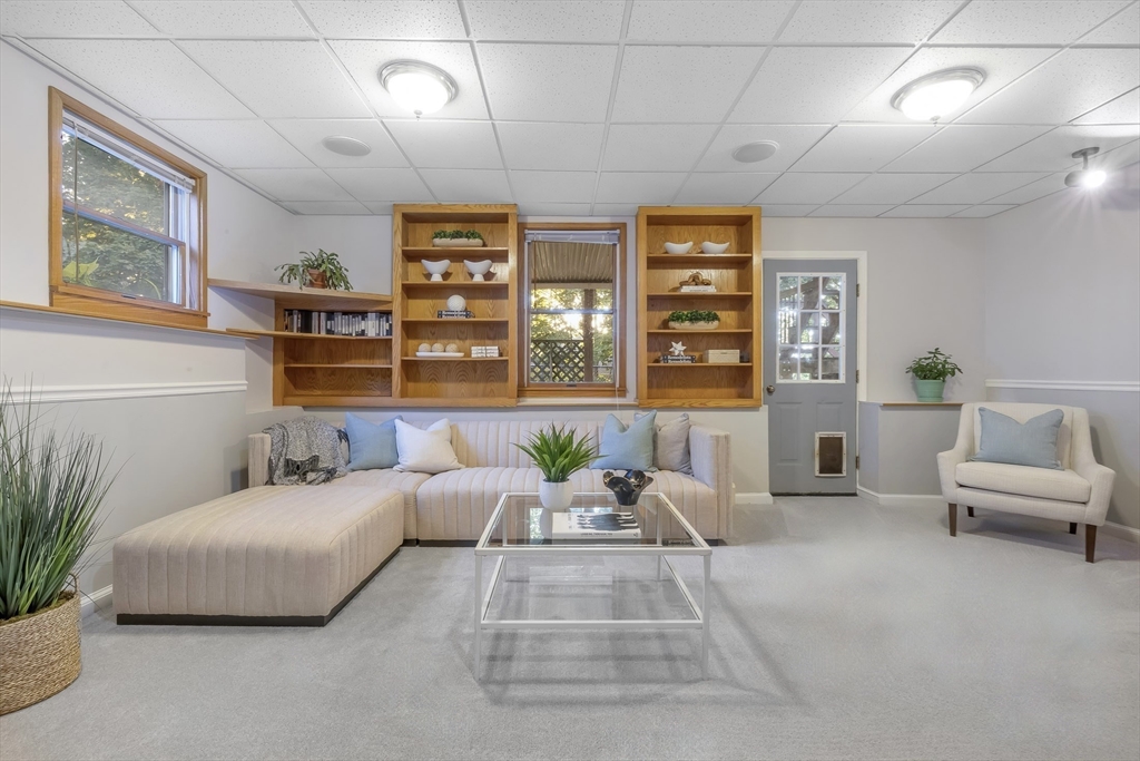 41 Filbert Street Quincy, MA 02169 - Photo 35 of 42 a living room with furniture and large windows