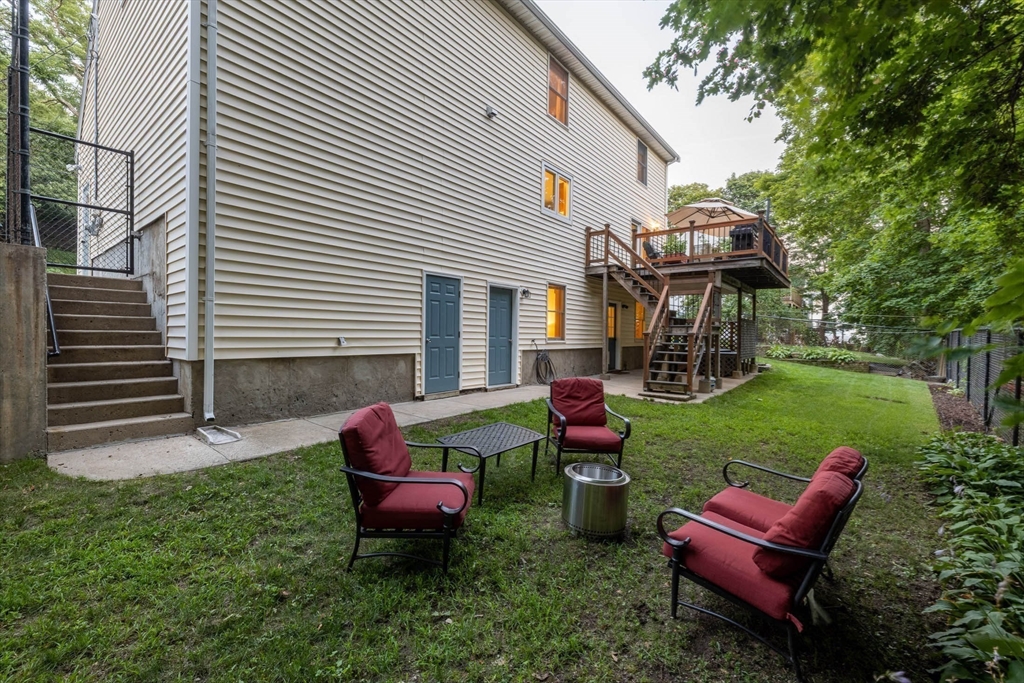 41 Filbert Street Quincy, MA 02169 - Photo 38 of 42 a view of yard with outdoor seating and green space