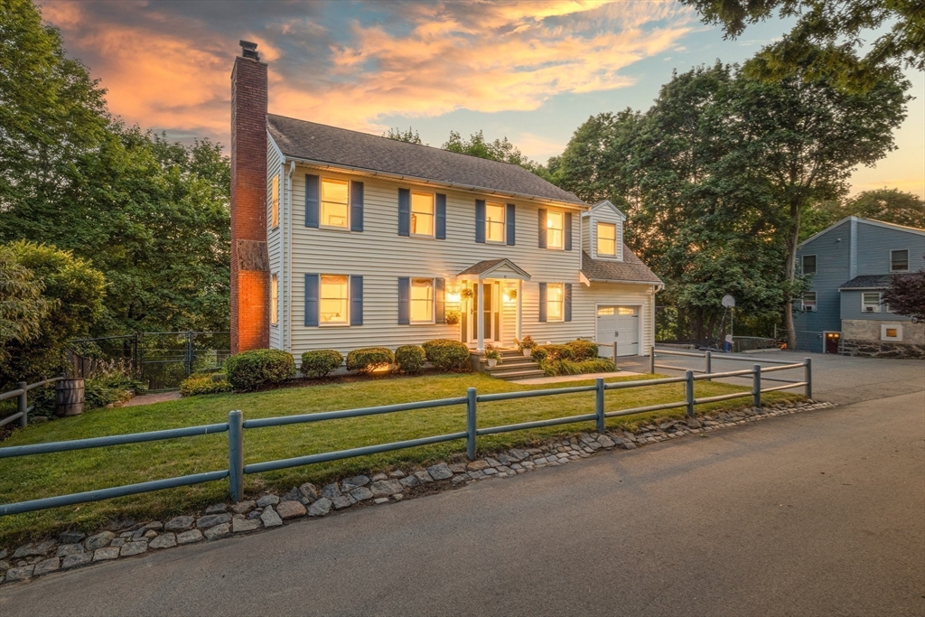 41 Filbert Street Quincy, MA 02169 - Photo 39 of 42 a view of a house with a big yard and a large tree