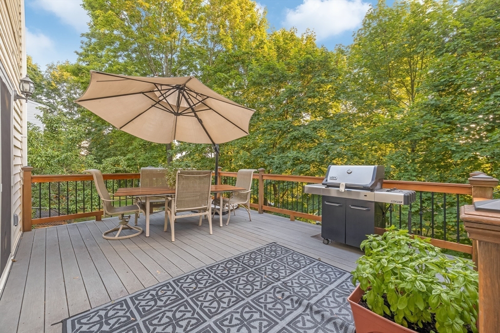 41 Filbert Street Quincy, MA 02169 - Photo 5 of 42 an outdoor space with furniture and umbrella