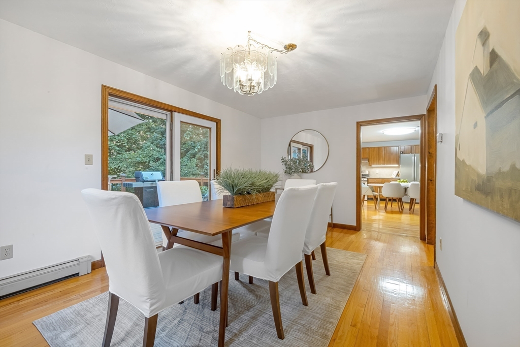 41 Filbert Street Quincy, MA 02169 - Photo 7 of 42 a view of a dining room with furniture wooden floor and a chandelier