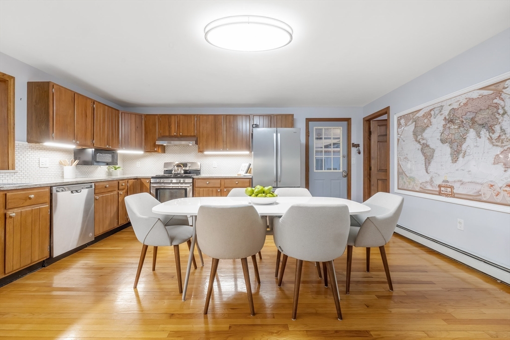 41 Filbert Street Quincy, MA 02169 - Photo 9 of 42 a view of a dining room with furniture window and wooden floor