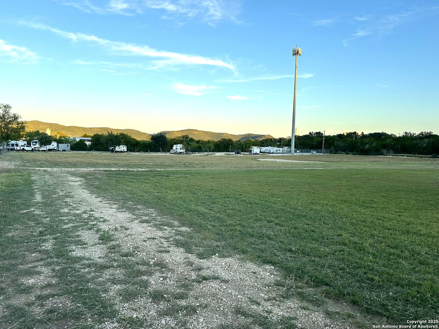 300 Summit Drive Leakey, TX 78873 - Photo 20 of 44 a view of a golf course with a lake