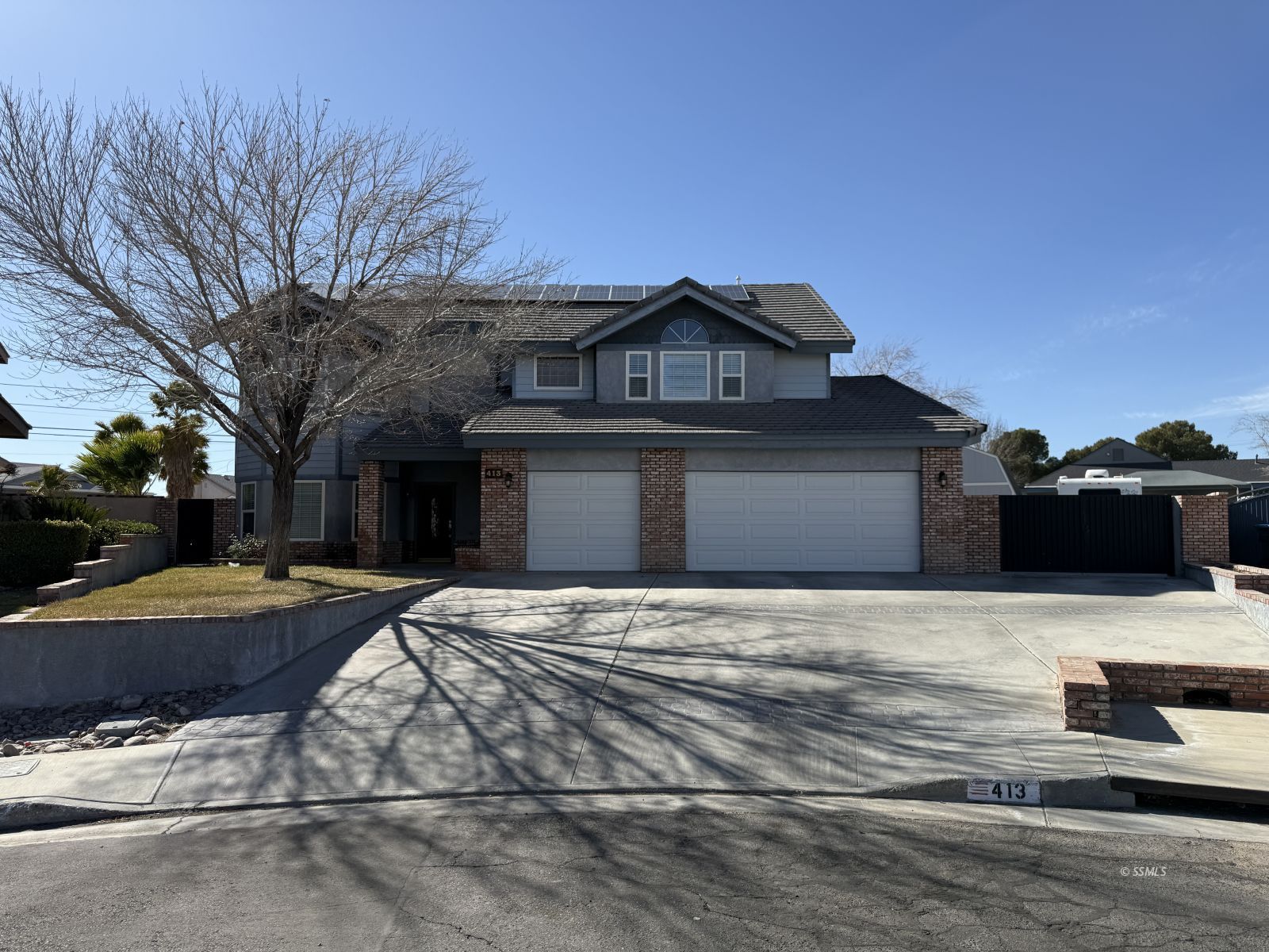 413 Laurkris Court Ridgecrest, CA 93555 - Photo 1 of 48 a front view of a house with yard