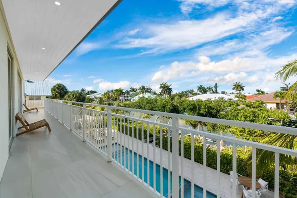 a view of a balcony with city view