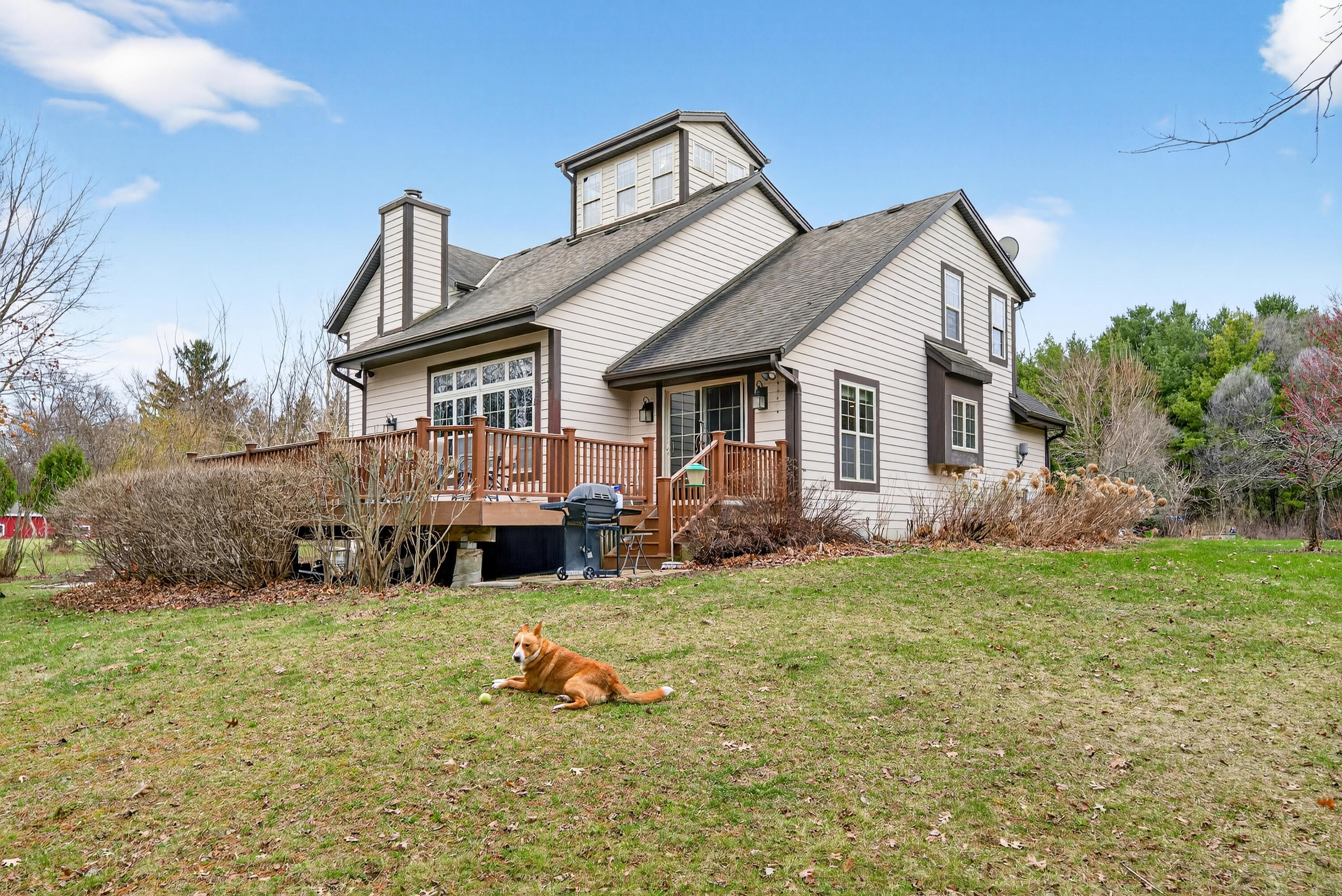 760 Mill Pond Road Dousman, WI 53118 - Photo 67 of 81 Back Of Home and Large Deck