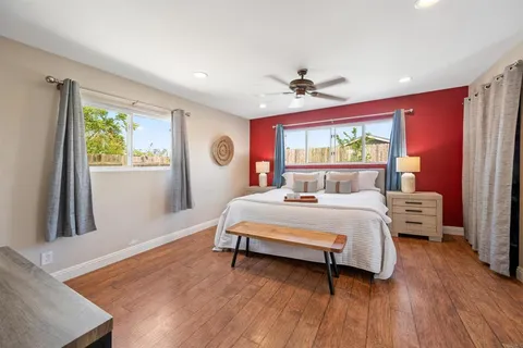 a bed room with a bed and a window