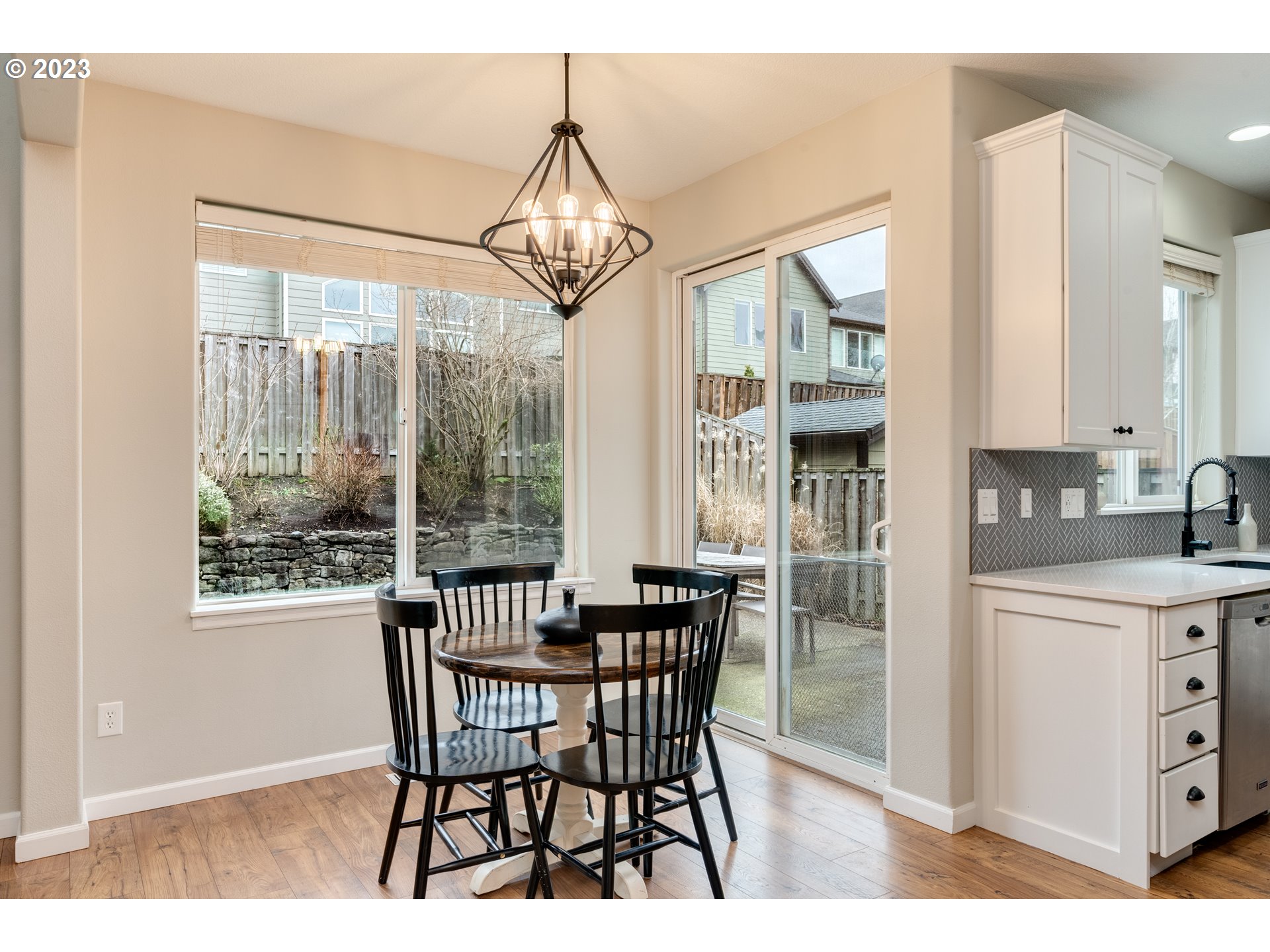 16270 Southeast Jasper Drive Damascus, OR 97089 - Photo 15 of 32 a view of a dining room with furniture window and outside view