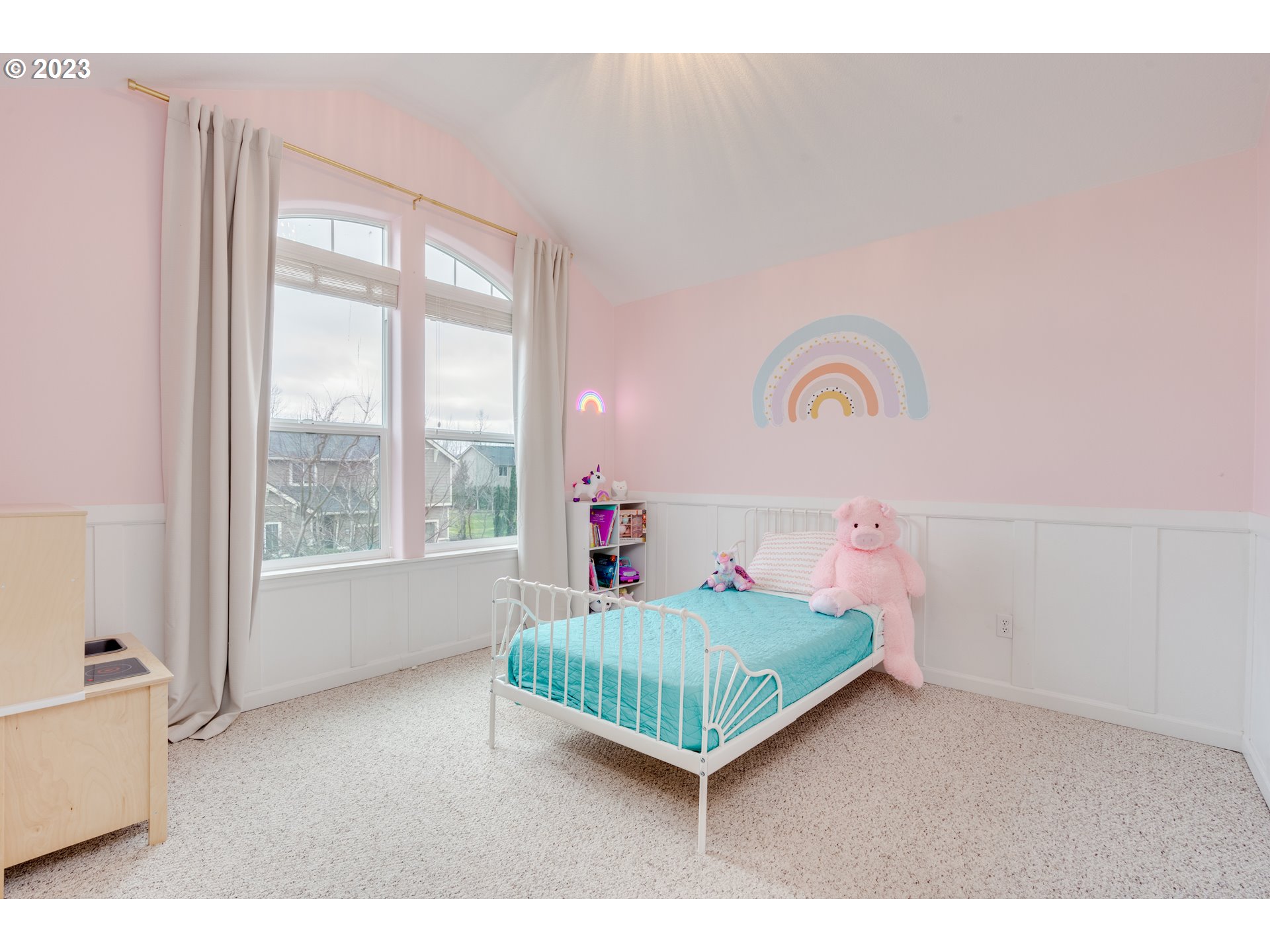 16270 Southeast Jasper Drive Damascus, OR 97089 - Photo 19 of 32 a bedroom with a bed and window