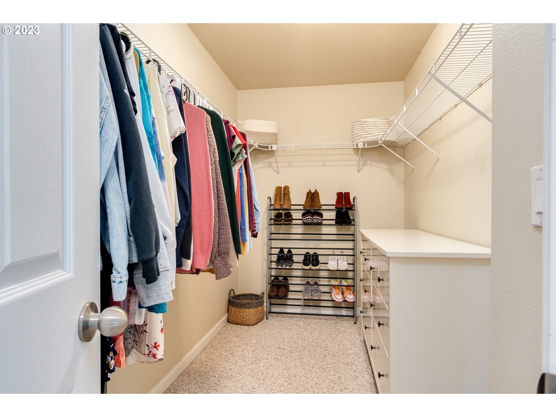 16270 Southeast Jasper Drive Damascus, OR 97089 - Photo 24 of 32 a view of walk in closet with clothes and shoes