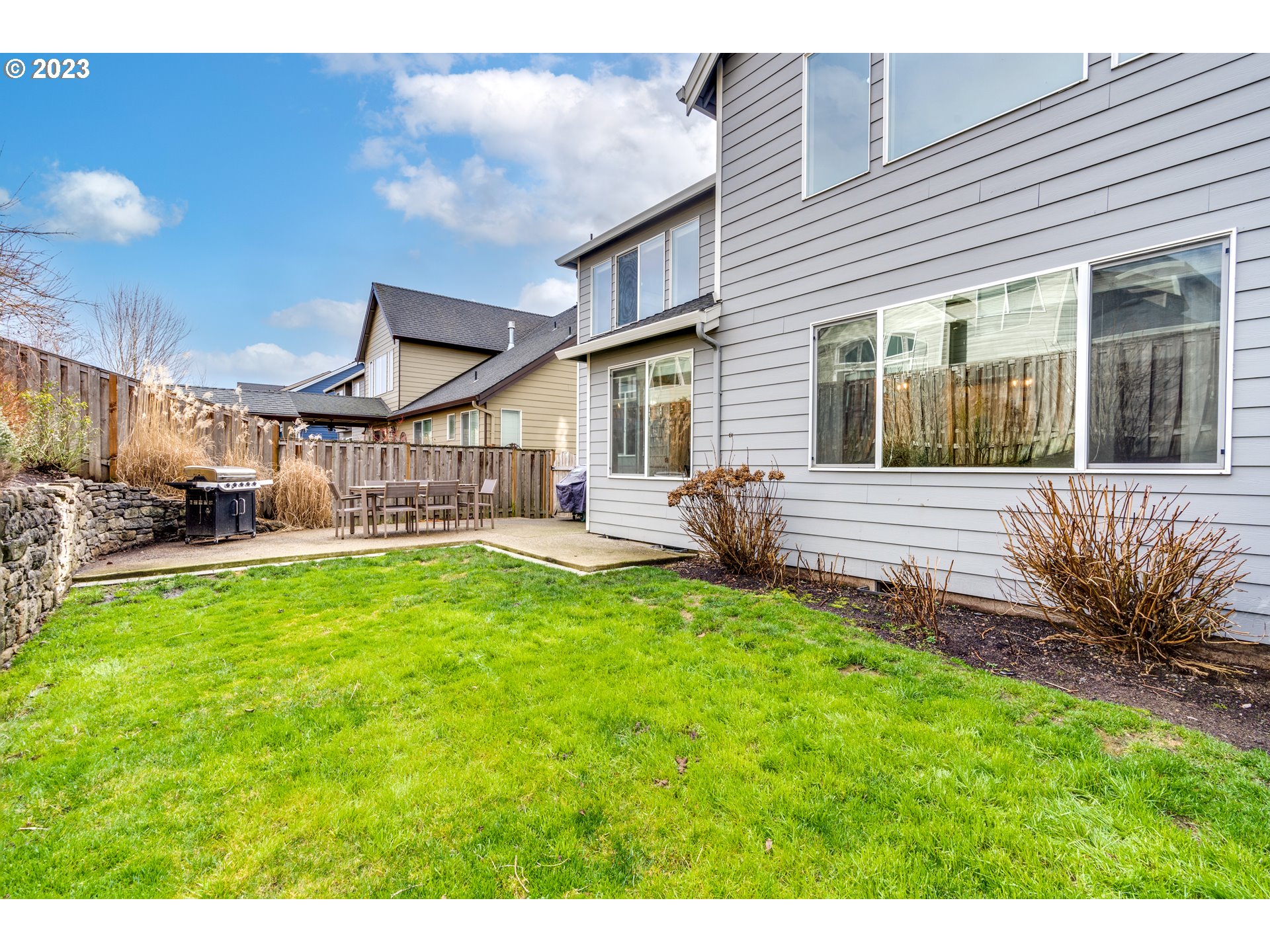 16270 Southeast Jasper Drive Damascus, OR 97089 - Photo 27 of 32 a front view of a house with a yard