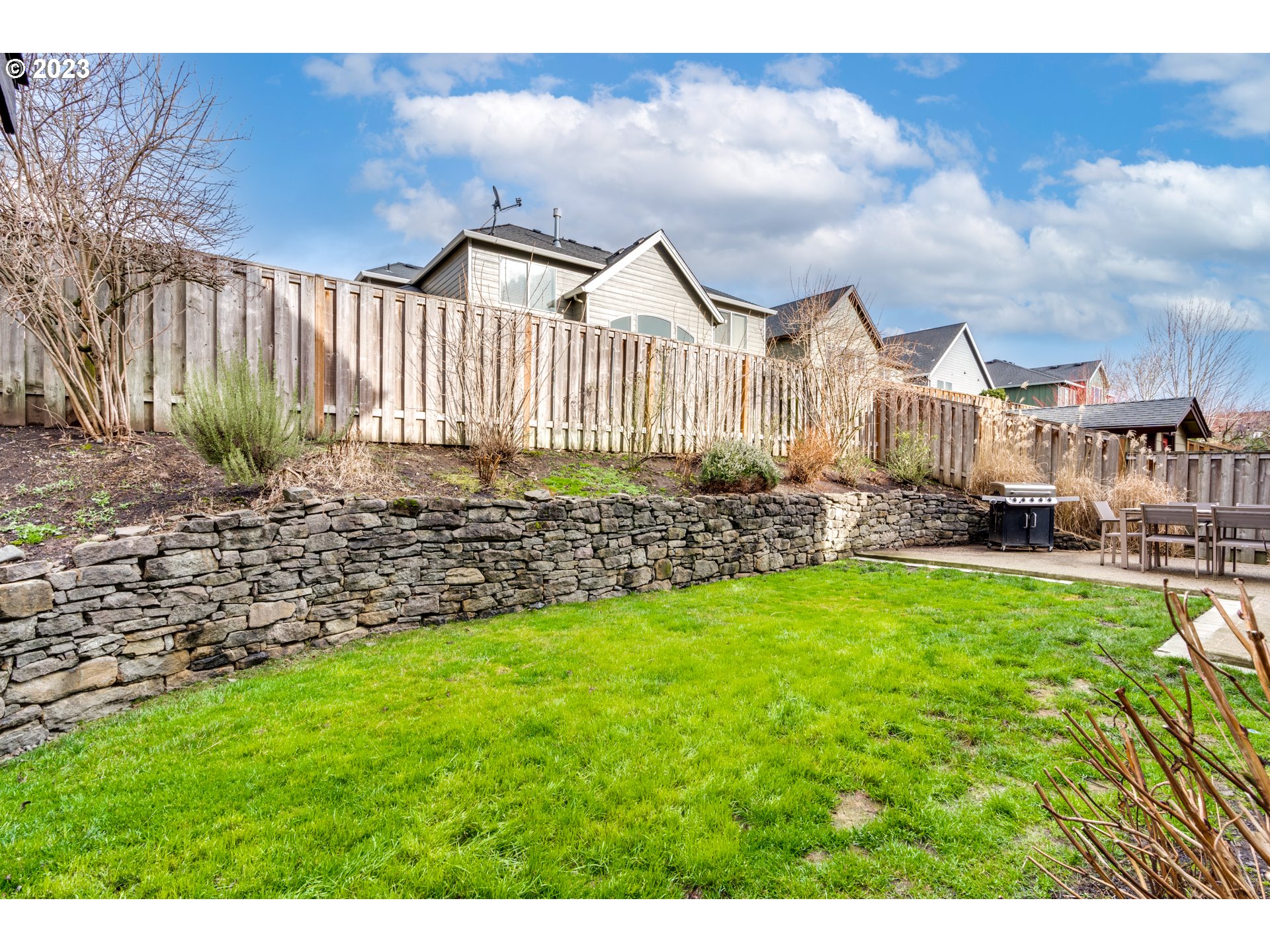 16270 Southeast Jasper Drive Damascus, OR 97089 - Photo 28 of 32 a view of a garden with a buildings