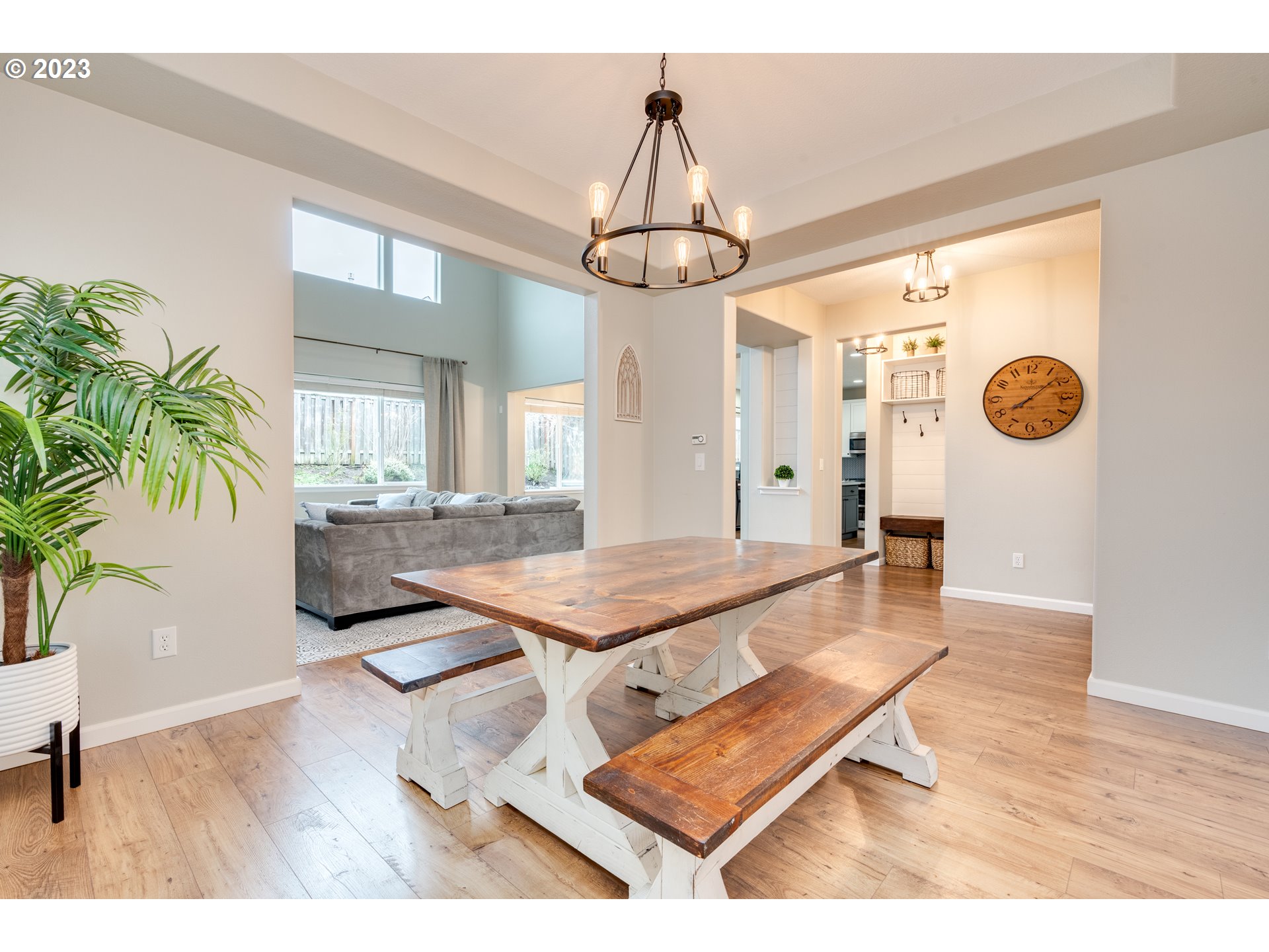 16270 Southeast Jasper Drive Damascus, OR 97089 - Photo 8 of 32 a dining room with wooden floor and chandelier