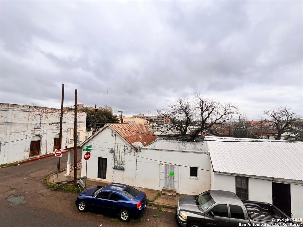 520 Davis Avenue, Unit B Laredo, TX 78040 - Photo 21 of 29 a car parked in front of a white house